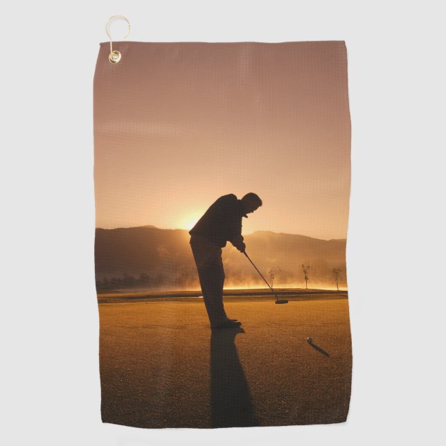 Man playing Golf at sunset Golf towels (Front)