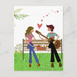 Man playing the guitar with a woman beside her postcard