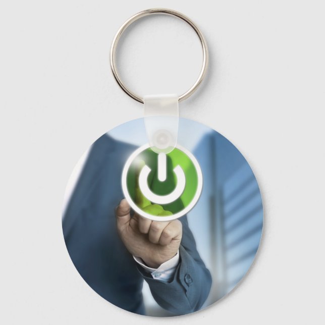 Man pushes power button concept background keychain (Front)