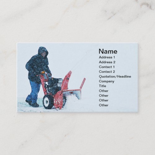 man pushing a snowblower business card