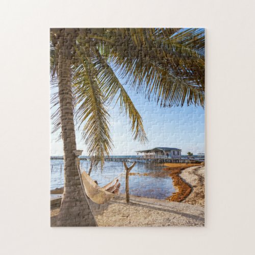 Man Relaxing In A Hammock Under Palm Tree Belize Jigsaw Puzzle