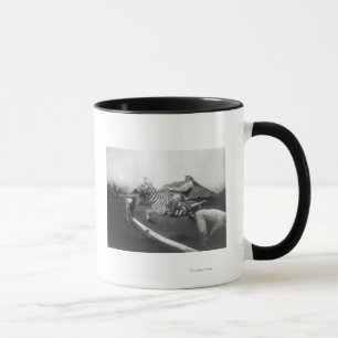 Man Riding Zebra Jumping Fence Photograph Mug