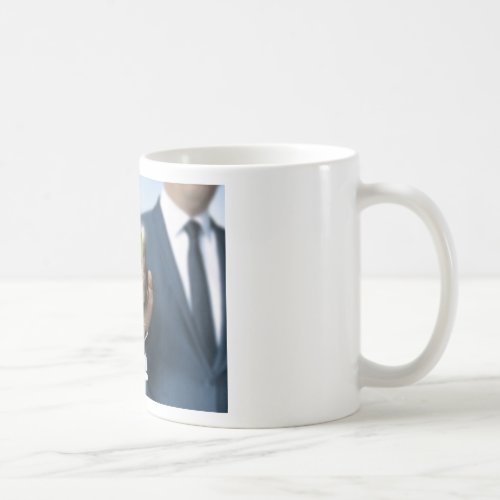 Man showing stock price touchscreen concept coffee mug