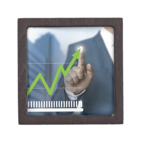 Man showing stock price touchscreen concept gift box