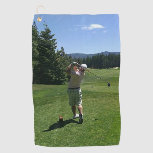 Man swinging a Golf field Golf Towels