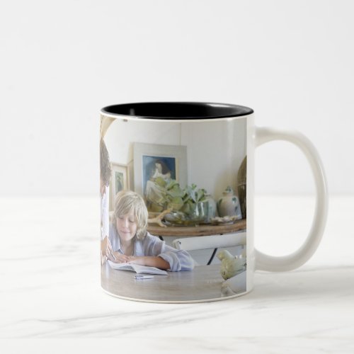 Man talking to little boy with brother using Two_Tone coffee mug