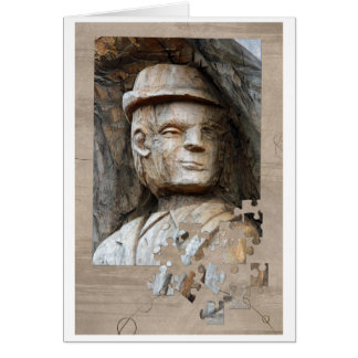 Man with hat carved in wood cards