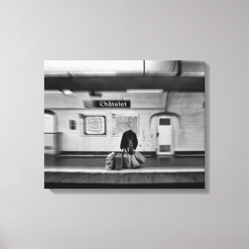 Man with shopping bags in subway Chatelet Canvas Print