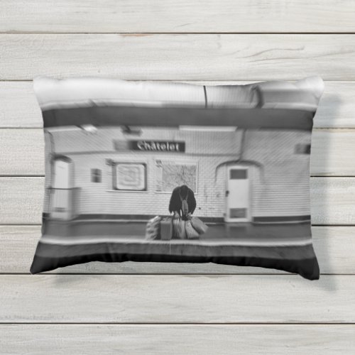 Man with shopping bags in subway Chatelet Outdoor Pillow