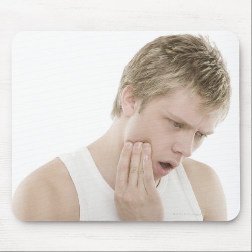 Man with toothache mouse pad