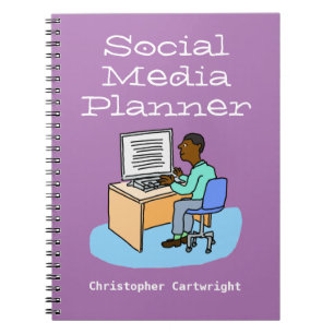 Man working on Social Media at a computer. Notebook