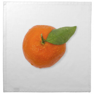 Mandarin with green leaf napkin