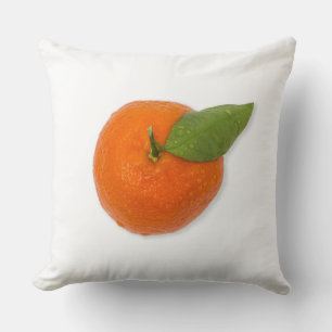 Mandarin with green leaf throw pillow