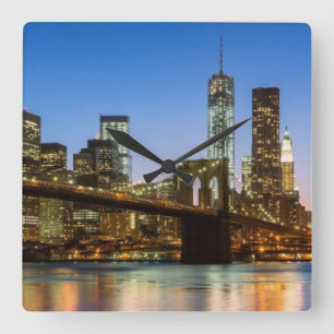 Manhattan and Brooklyn Bridge at dusk Square Wall Clock