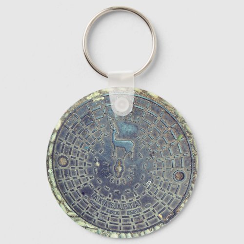 Manhole cover and cobblestone road keychain