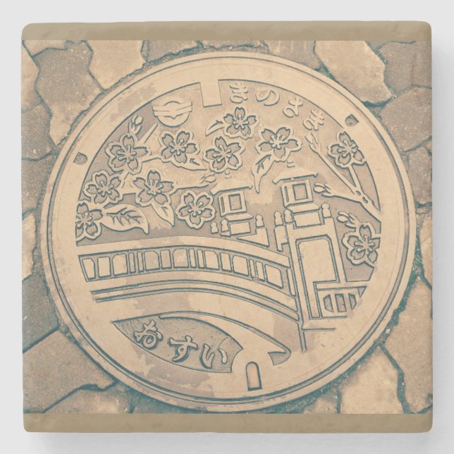 Manhole cover and cobblestone road stone coaster (Front)