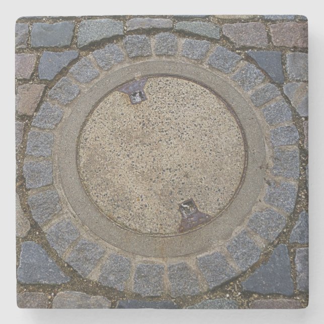 Manhole cover cobble stone road gray brown coaster (Front)