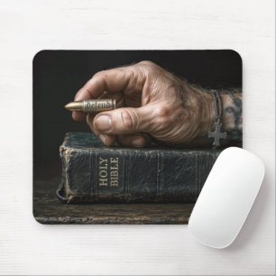 Man's Hand on a Bible Holding a Bullet Mouse Pad