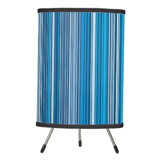 Many multi colored stripes in the blue... tripod lamp