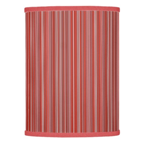 Many multi colored strips in red lamp shade