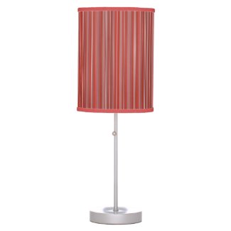 Many multi colored strips in red table lamp