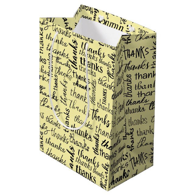 Many Thanks Black Text On Yellow Medium Gift Bag (Back Angled)