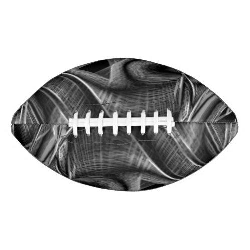 Many twisted with gray grooves on black background football
