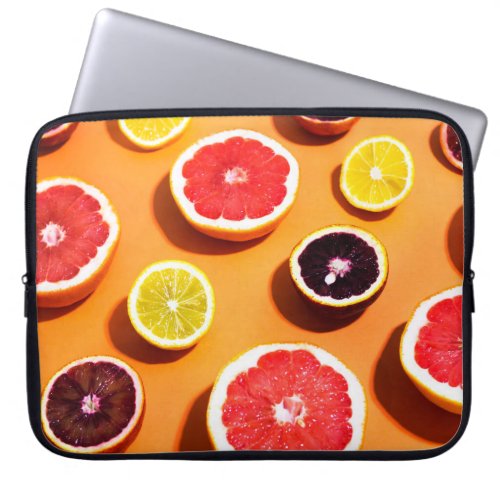 Many variety citrus fruits pattern in sunlight on  laptop sleeve