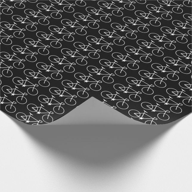 Many White Bicycle Icons on a Black Background Wrapping Paper (Corner)