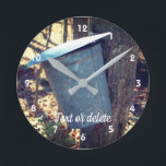 Maple Syrup Sap Bucket On Tree Personalized Round Clock<br><div class="desc">Maple sugar syrup sap running from the tree with buckets is one of the first signs of spring in New England. Nature photography by Susan. This image is available on many cards and products in my main store Smilin' Eyes Treasures. Visit my Profile page to find links to all of...</div>