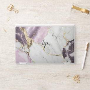 Marble texture background with a luxurious HP laptop skin