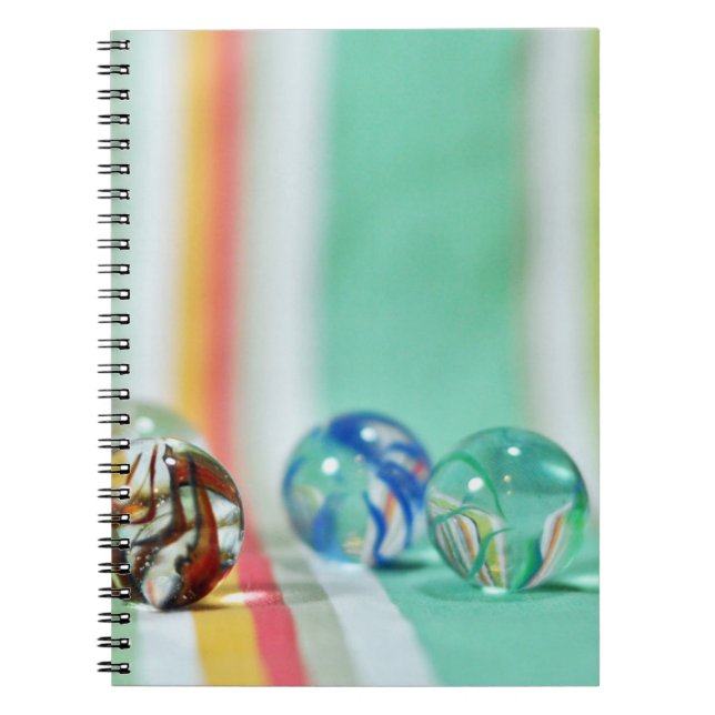 Marbles on a striped background notebook (Front)