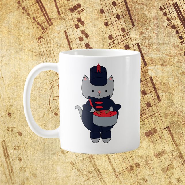 Marching Band Snare Drum Cat Navy Blue Red Coffee Mug (A mug with a gray cat playing the snare drum in a red and navy blue marching band uniform.)