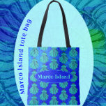 Marco Island Florida Sea Shell Nature Art Tote Bag<br><div class="desc">Marco Island, FL pretty scallop shell tote bag. A beautiful nature design, featuring a scallop shell pattern with a dramatic bold blue background which appears to glow. The shells are a light turquoise, which pop against the vibrant background. This stylish souvenir is the perfect way to show your love for...</div>