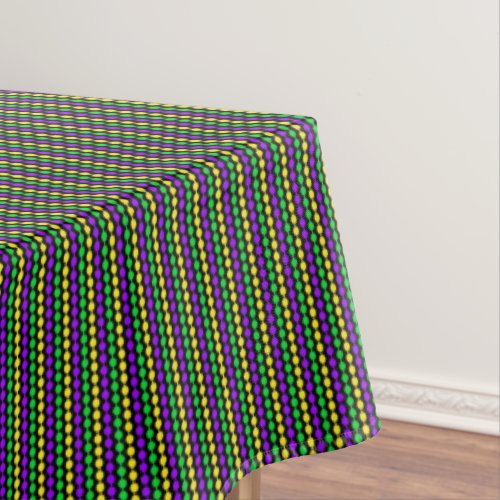 Mardi Gras Green Yellow Purple Beads on Black Tablecloth