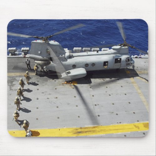 Marines board a CH_46E Sea Knight helicopter Mouse Pad