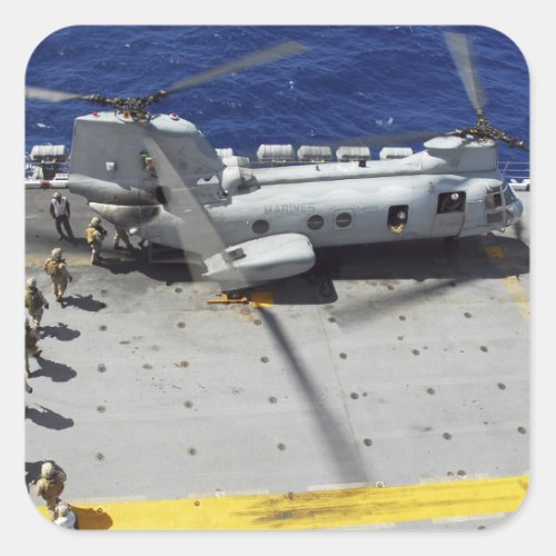 Marines board a CH_46E Sea Knight helicopter Square Sticker