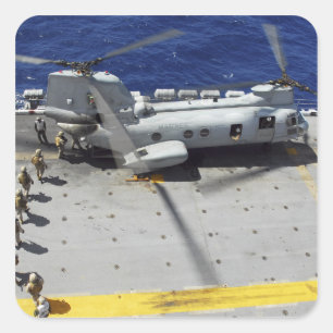 Marines board a CH-46E Sea Knight helicopter Square Sticker