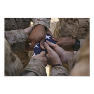 Marines fold an American flag Photo Print