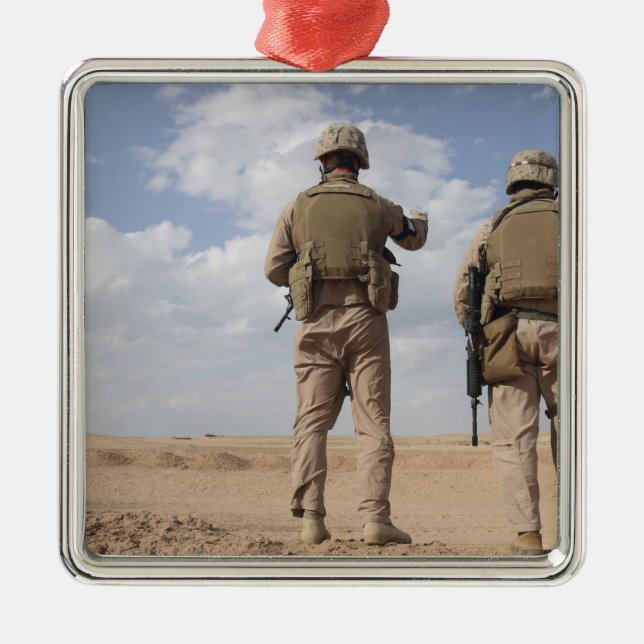 Marines scan the horizon for insurgent activity metal ornament (Front)