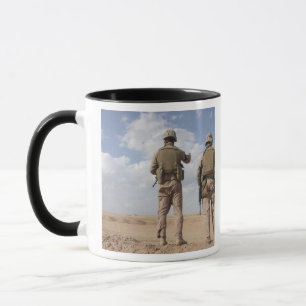 Marines scan the horizon for insurgent activity mug