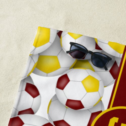 Maroon gold soccer balls sports team colors beach towel
