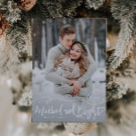 Married and Bright Whimsical Script Photo Holiday Card<br><div class="desc">Elegant and stylish holiday vertical 2-photo card for the newlyweds celebrating their first Christmas together as husband and wife featuring a hand lettered script with swirl that says "Married and Bright." There is also snow and snowflakes around the typography text. Customize this product by adding the couple's pictures and names....</div>