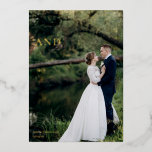 Married and Merry Elegant Wedding Photo Gold Foil Holiday Card<br><div class="desc">Gorgeous gold foil calligraphy reading Married and Merry over your full wedding photograph for a beautiful newlywed holiday card. This just married couple Christmas card features big cursive script at the top. Add a 2nd couple photo on the back and your personalized text.</div>