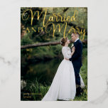 Married and Merry Elegant Wedding Photo Gold Foil Holiday Card<br><div class="desc">Gorgeous gold foil calligraphy reading Married and Merry over your full wedding photograph for a beautiful newlywed holiday card. This just married couple Christmas card features big cursive script at the top. Add a 2nd couple photo on the back and your personalized text.</div>