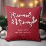 Married and Merry Our First Christmas Newlywed Red Throw Pillow<br><div class="desc">Looking for a way to make your loved ones' first Christmas as a married couple extra special? Our "Our First Christmas Married and Merry" throw pillow in Christmas red is the perfect gift idea! With its clean and modern font and classic holiday colors, this pillow will add a festive touch...</div>
