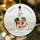 Married Christmas Cute Mistletoe Newlyweds Photo  Ceramic Ornament<br><div class="desc">Cherish your first Christmas together with our 'Married Christmas' ornament. Customized for the newlyweds' joyous memories with 2 favorite wedding photos as well as a cute watercolor mistletoe illustration,  your names and date of nuptials.🎄📸✨ #FirstChristmasJoy #PersonalizedKeepsake</div>