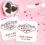 Married in Fabulous Las Vegas Red Wedding Monogram Square Paper Coaster<br><div class="desc">Custom "Married in Fabulous Las Vegas" wedding beverage coasters feature a monogram of the bride and groom's names and wedding dates. Black,  red,  blue,  and yellow design colors.</div>