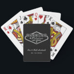 Married in Fabulous Las Vegas Silver Wedding Poker Cards<br><div class="desc">These unique and fun custom "Married in Fabulous Las Vegas" wedding favor playing cards feature a silver faux foil design inspired by the Welcome to Las Vegas,  Nevada" sign,  along with monogram text that can be personalized with the couple's name and wedding date. Black background color can be modified.</div>