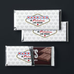 Married in Fabulous Las Vegas Wedding Monogram Hershey Bar Favors<br><div class="desc">These unique and fun custom "Married in Fabulous Las Vegas" wedding Hershey Chocolate Bar favors feature a design inspired by the Vegas welcome sign on the front, with a monogram of the bride and groom's names and wedding date on the back. White background with heart pattern and black, red, blue,...</div>